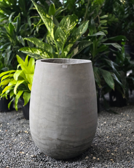 Matera en forma de gota hecha de concreto gris – Concrete Decor